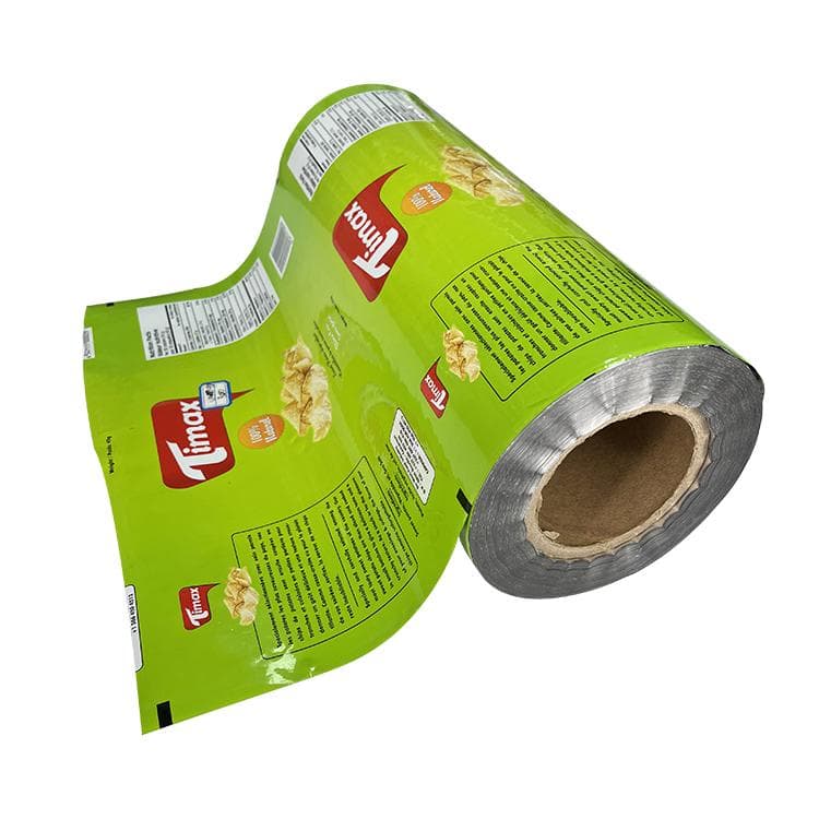 Green printed snack packaging film roll showing a laminated flexible structure