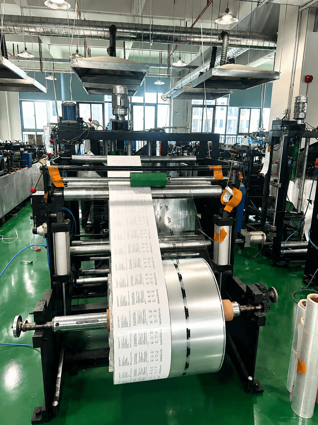 Flexible packaging bag converting equipment on the factory floor